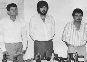 Amado Carrillo Fuentes (center) with other members of the Juarez cartel in the 1980s.