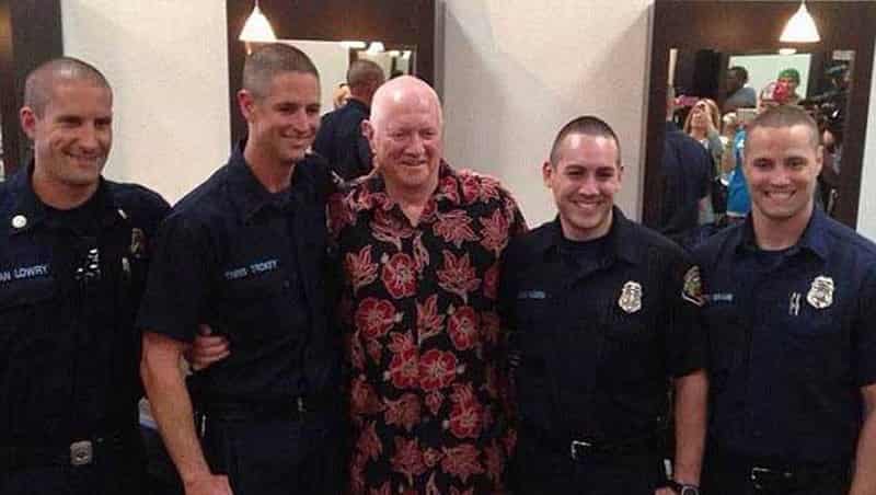 Chris Trokey (second from left) saved the life of Michael Shannon (center) with fellow paramedics 30 years after the doctor saved his life as a newborn.   